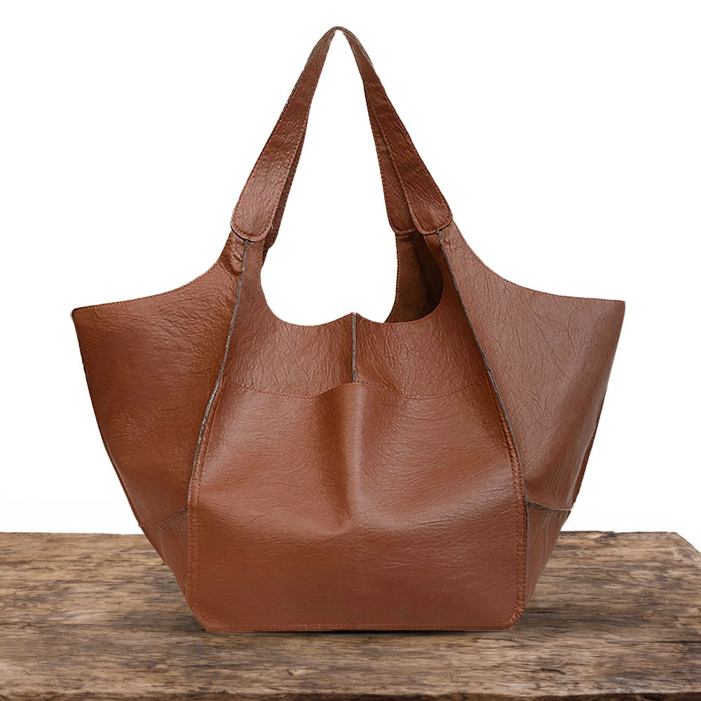 A Atração Atemporal de Laura | Bolsa Vintage