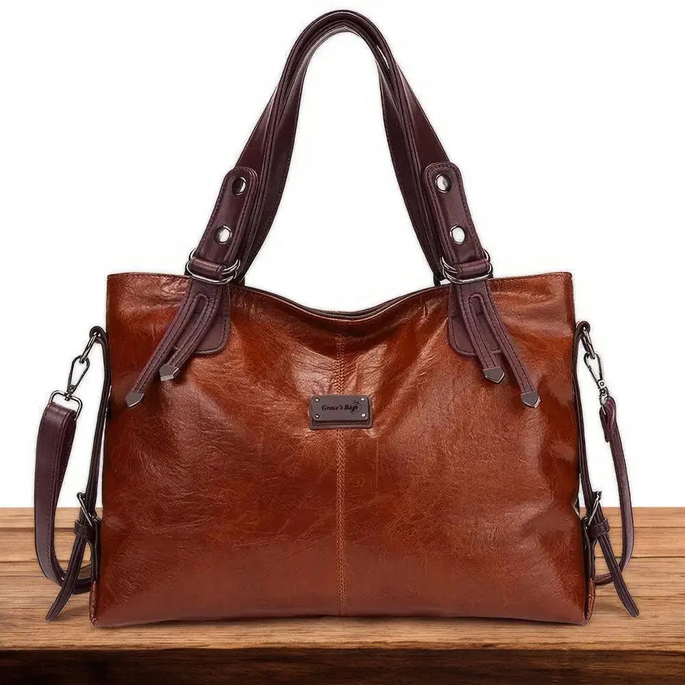 Claire™ | Bolsa de Viagem Clássica