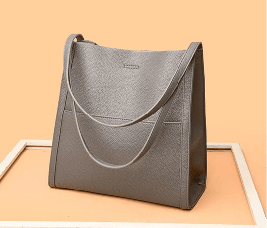 Bolsa de ombro simples em couro genuíno de cor sólida