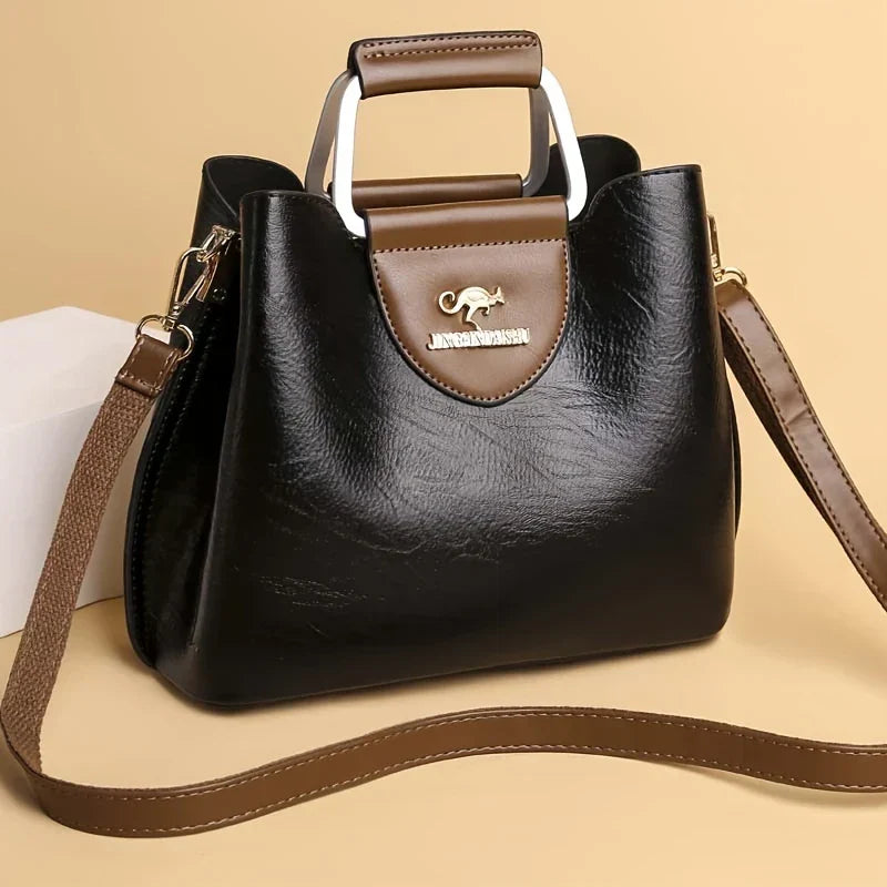 Isabella - Bolsa Bucket de Couro Chic