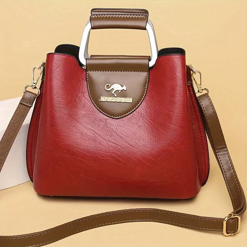 Isabella - Bolsa Bucket de Couro Chic