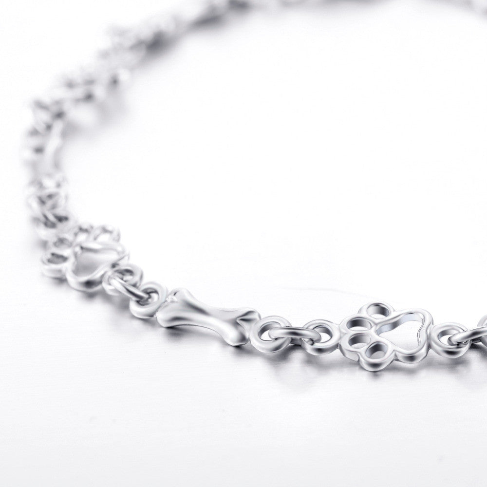 Pulseira de Charms em Prata Pura com Pata de Cachorro e Osso - Edição Limitada