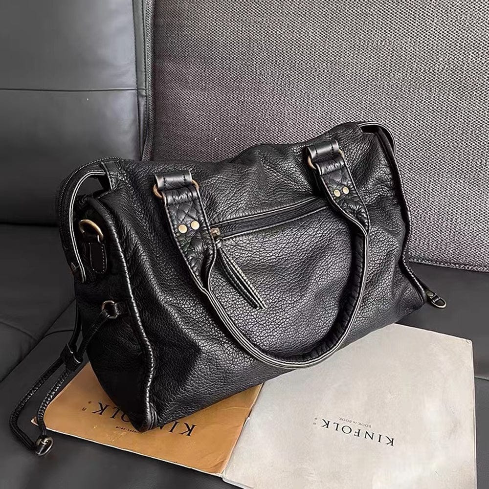 Bolsa de mão preta de couro vintage elegante