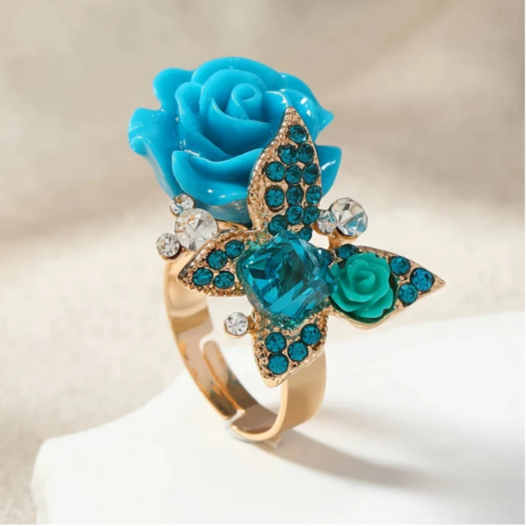 ANEL DOURADO COM FLOR BORBOLETA AZUL BRILHANTE