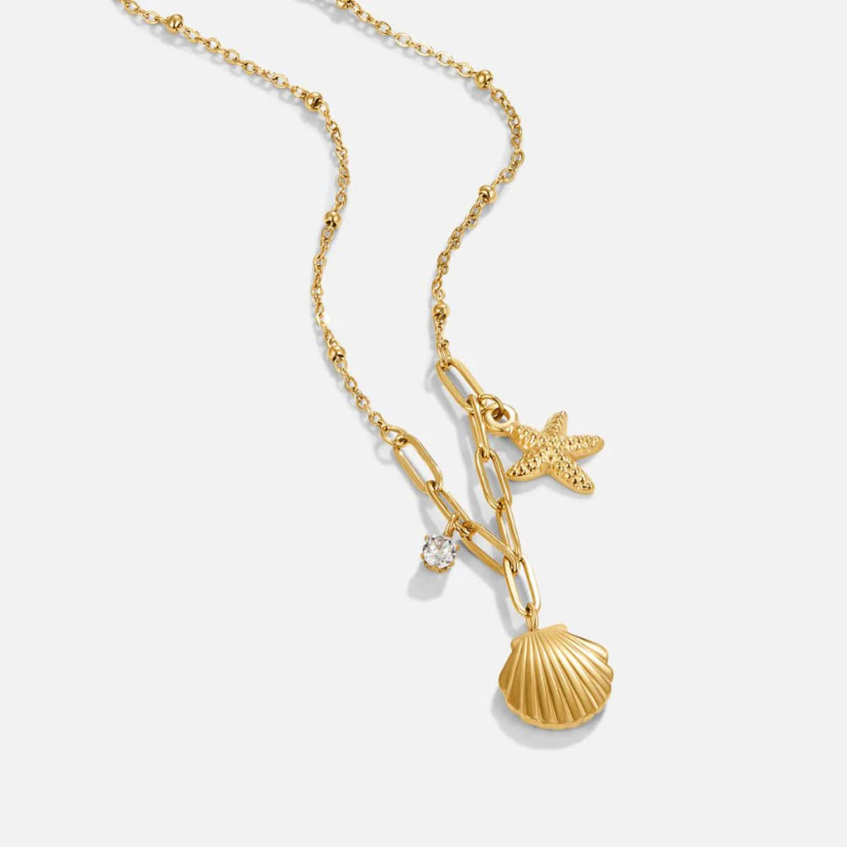 COLAR DE ESTRELA DO MAR COM CONCHA DOURADA