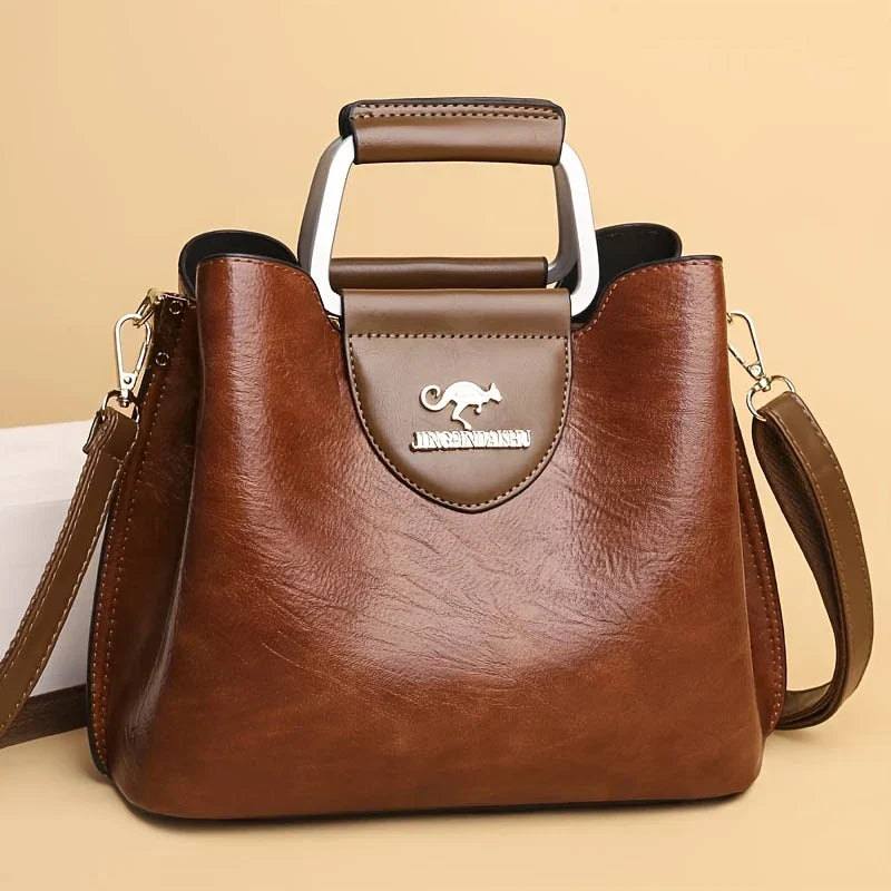 Isabella - Bolsa Bucket de Couro Chic