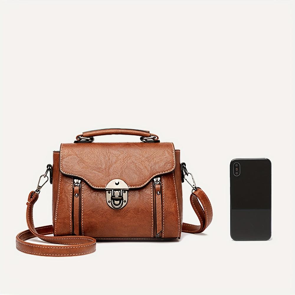 Zoe - Bolsa de Ombro de Couro Elegância Atemporal
